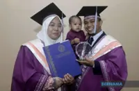 Married couple brings baby along for special convocation ceremony