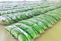 Brunei youth break national record with longest traditional snack roll