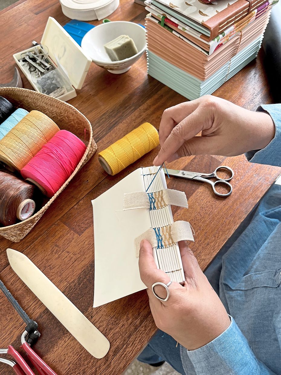 Before embarking on a project, Samsiah has to plan the type of stitching and material.