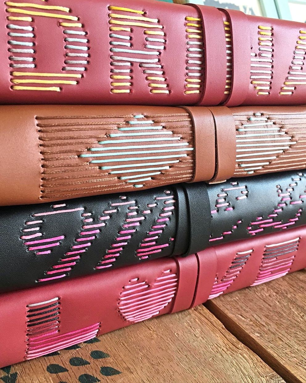 Samsiah uses the long stitch technique on many of her custom-made books.
