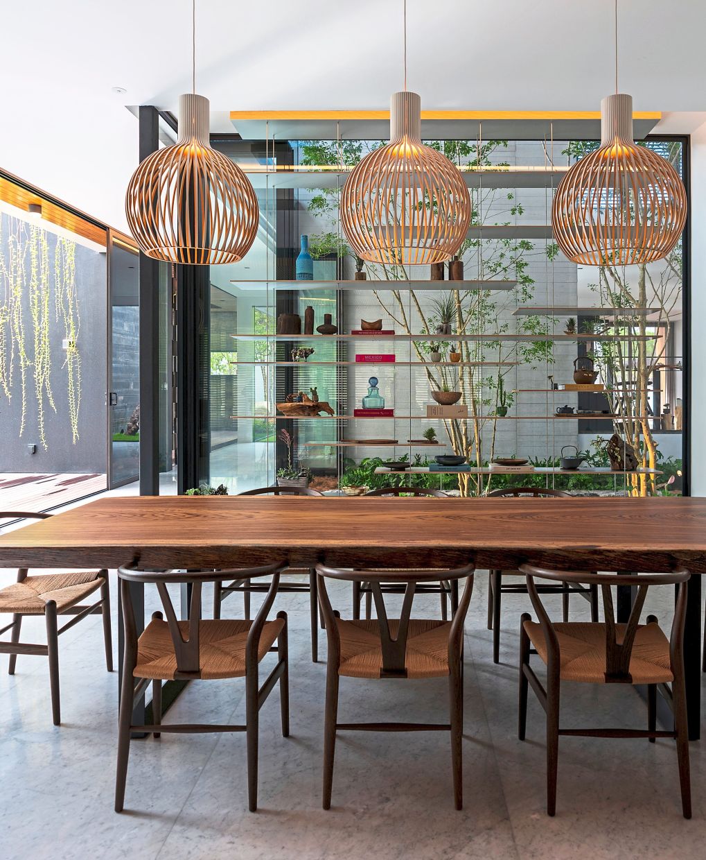 The interior of the T-House features a warm material palette with extensive use of timber.