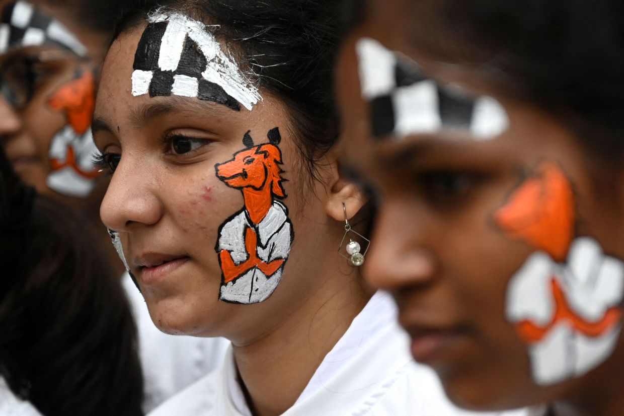 Children perform during an event organised ahead of the 44th Chess Olympiad 2022, in Chennai on July 26, 2022. - AP