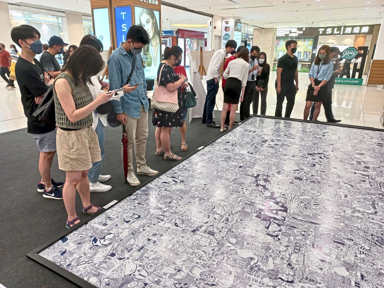 ‘The Great Story of the Infinite Drawing’ had shoppers at Gurney Plaza scanning a giant fresco to enable it to come alive via augmented reality.