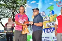 Fishing out trash from Sg Tebrau