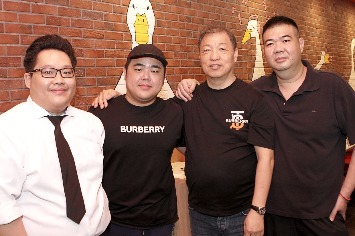 (From left) The Travelling Duck (Tropicana Gardens Mall) manager Benard Teh, The Travelling Duck director Andrew Tan, Cheung and Sim.