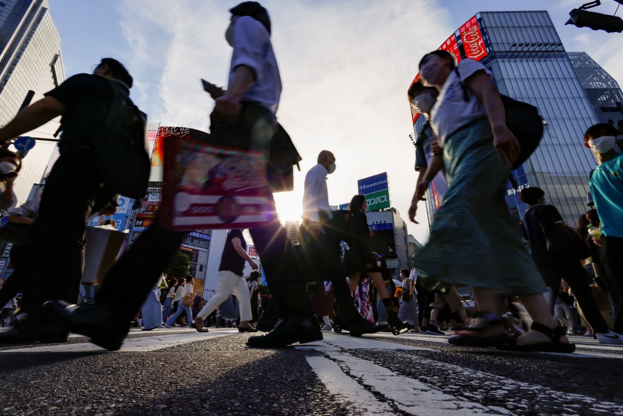 Work stoppages and no chatting at lunch: Japan Inc grapples with Covid - Vimarsana News