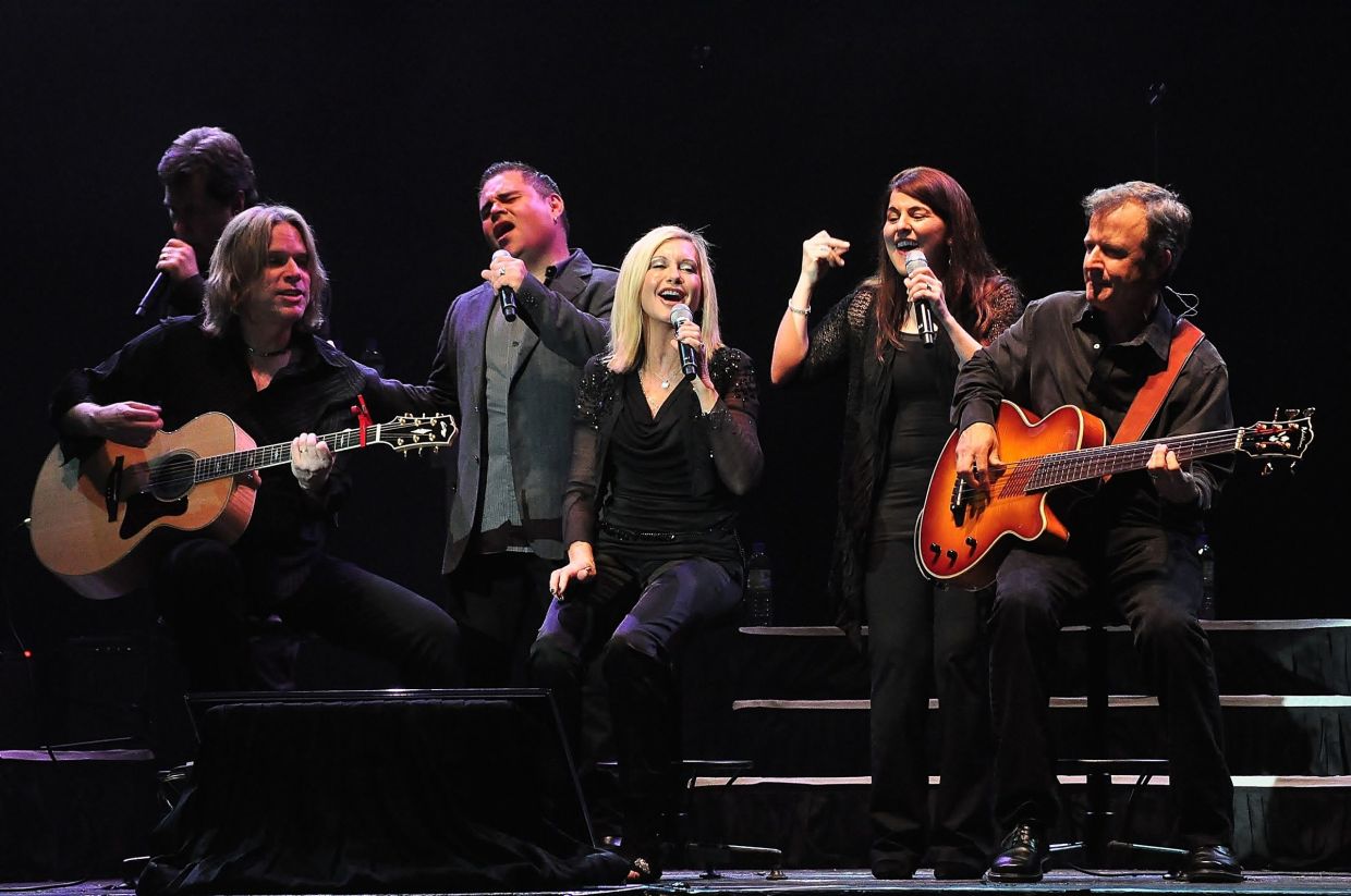 Olivia Newton-John (centre) at her 2012 concert in Genting Highlands