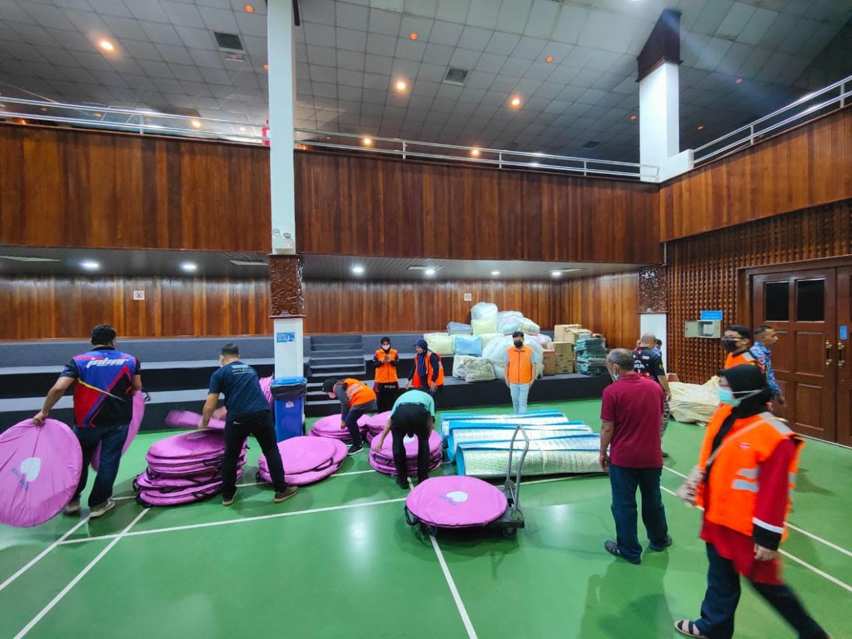 Preparations being made at Dewan Taman Johor Jaya to house those whose homes were destroyed by strong winds and heavy rain on Aug 12, 2022.  