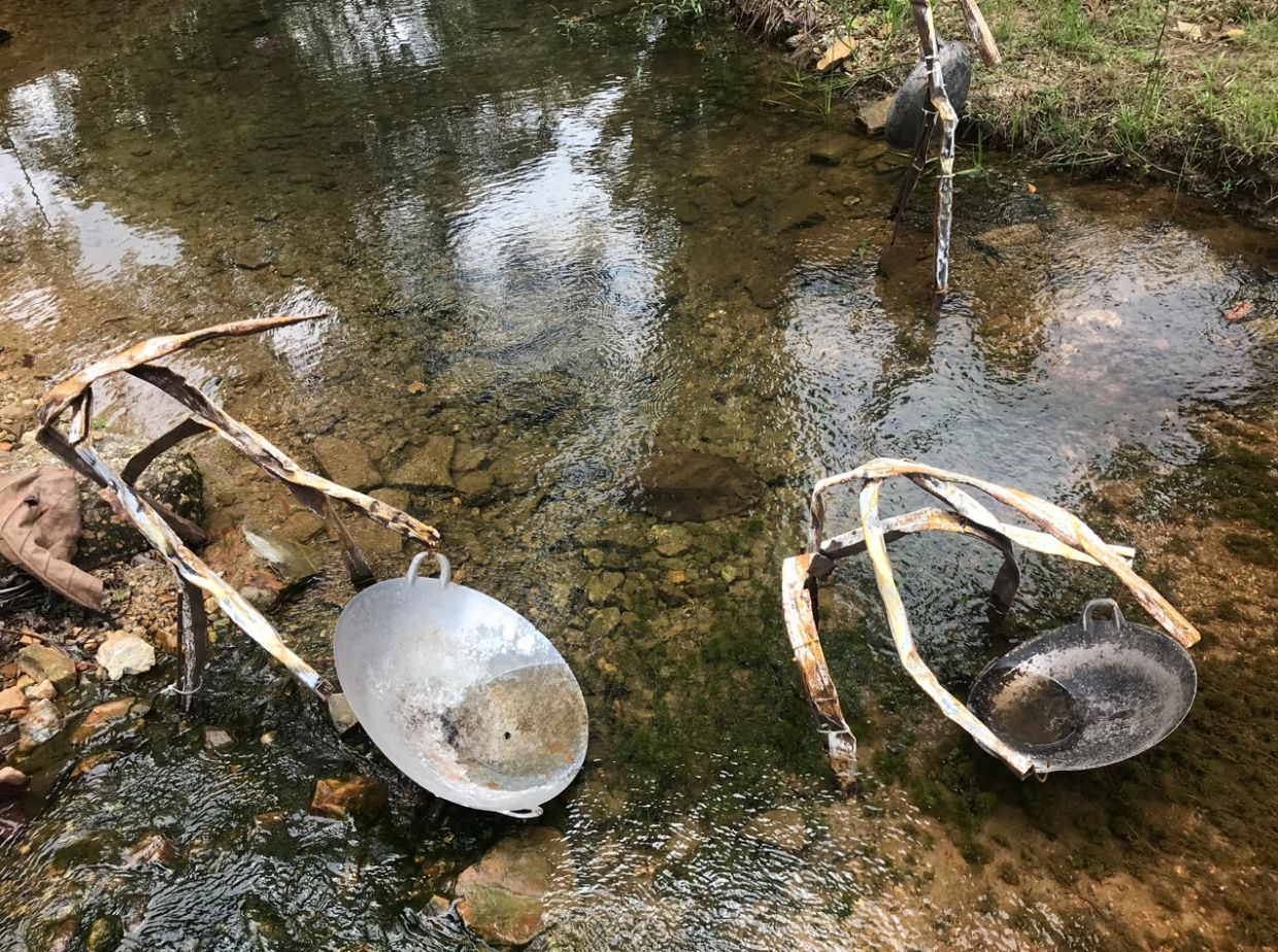 Installation 'Dulang' (metal, woks, 2022) by David Wong.  Photo: Lostgen's 