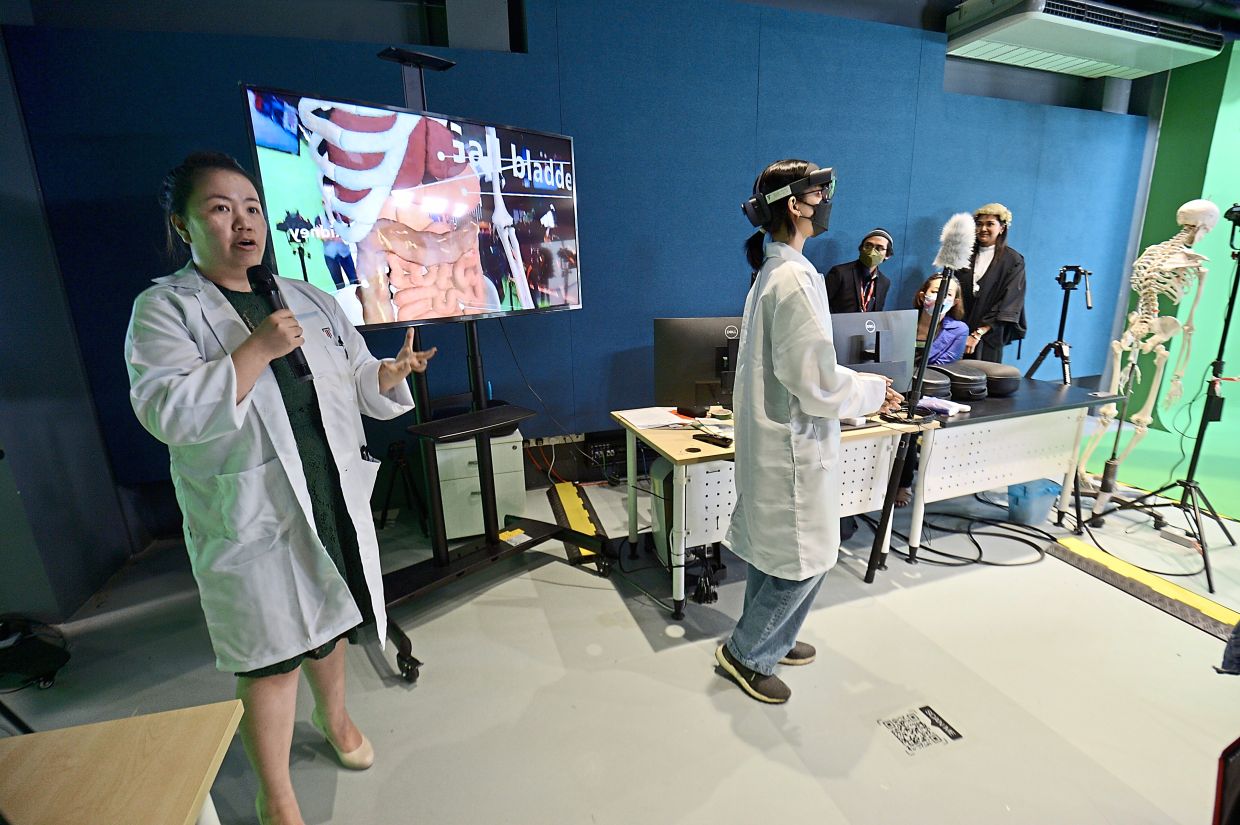 The HoloLens2 station demonstrates how mixed reality can allow bioscience students to study human anatomy without using cadavers.