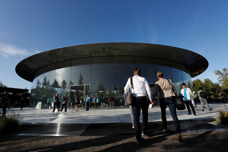 FILE PHOTO Guests arrive for at the Steve Jobs Theater for an Apple event at their headquarters in Cupertino California U.S. September 10 2019. REUTERSStephen LamFile Photo