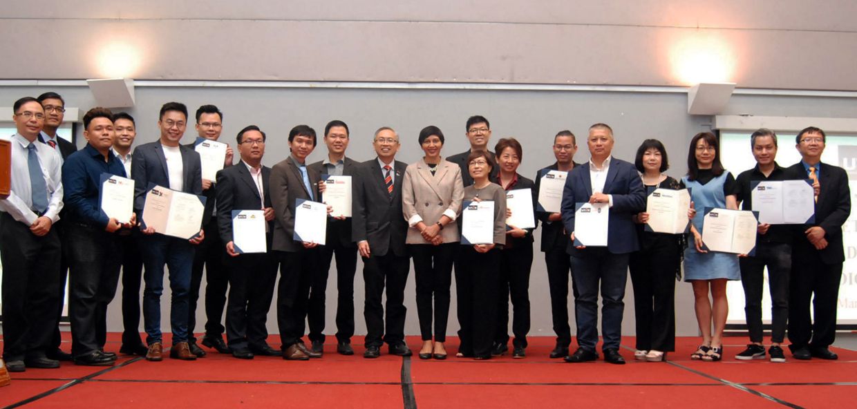 Group Photo of the first MoU ceremony in March 2020 with UTAR’s Dr Choo (far left) with leading companies in the industry.