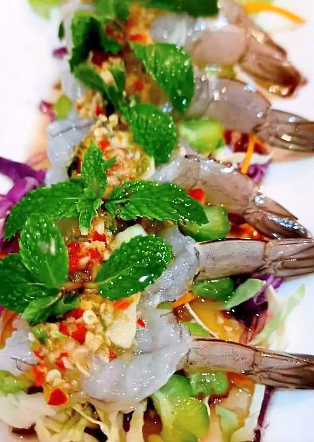 Plump raw prawns awash in a spicy sauce make for a meeting of soulmates.