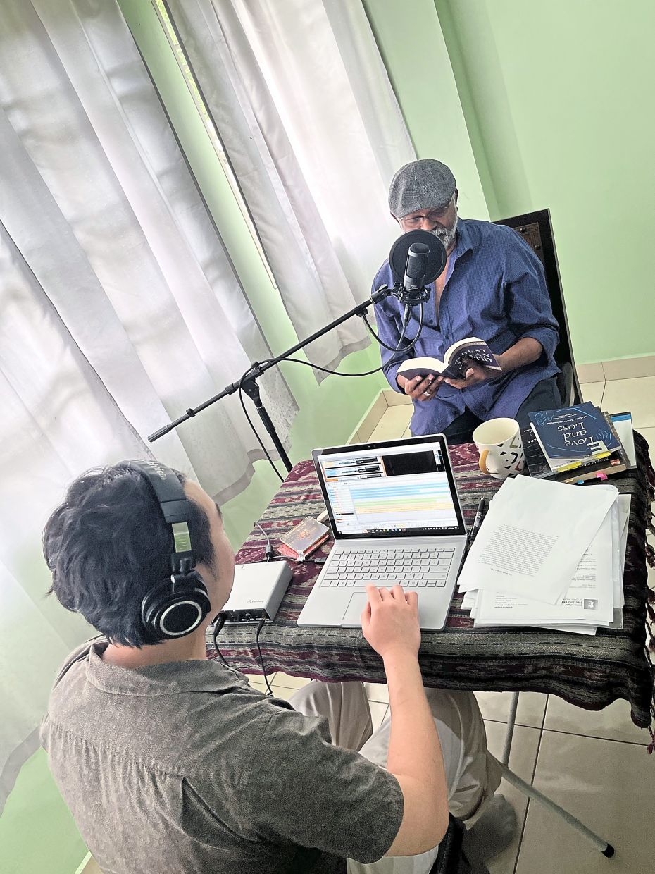 Renowned poet and author Malachi Edwin Vethamani (right) during a recording session for the exhibition. Photo: Ken Cheong