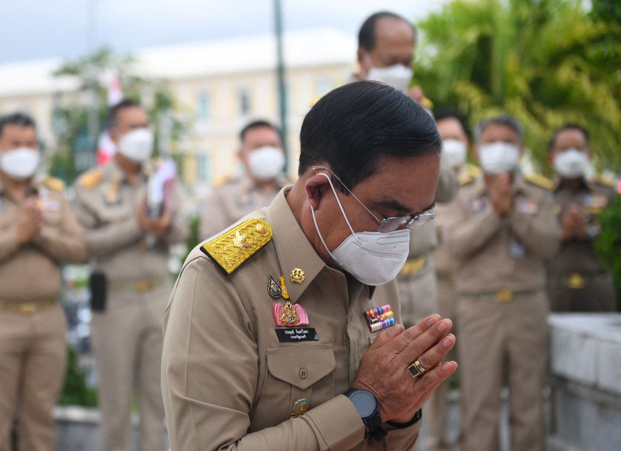 Thailand's Prime Minister Prayut Chan-O-Cha offers prayers at a shrine at the Interior Ministry in Bangkok, Thailand on Monday October 3, 2022. - Reuters