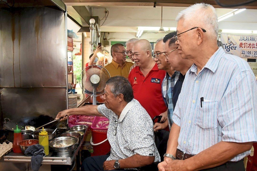 Ling frying char kuey teow at Golden Kim Wah Coffee Shop in Petaling Jaya.