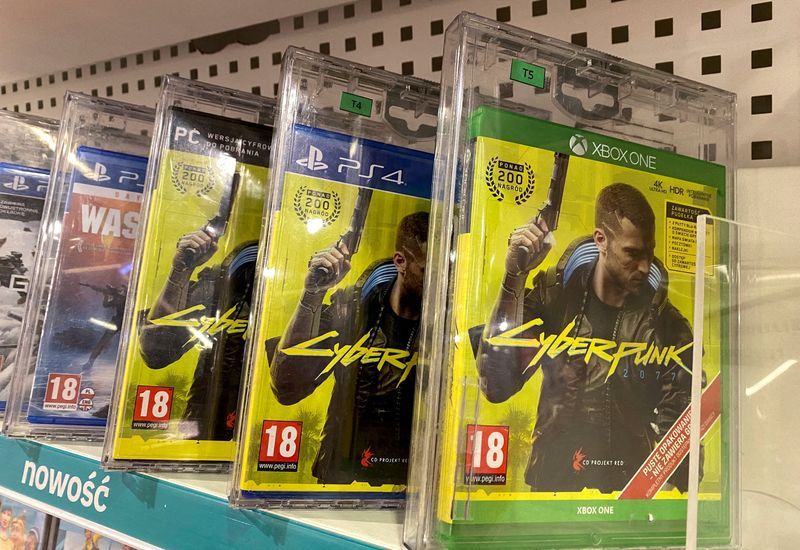 FILE PHOTO Boxes with CD Projekts game Cyberpunk 2077 are displayed in Warsaw Poland Dec. 14 2020. REUTERSKacper Pempel