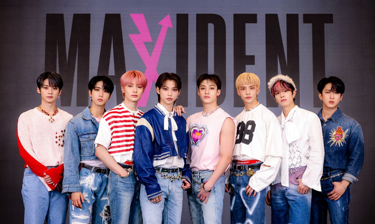 Boy band Stray Kids pose during an online press conference held for their new album, 'Maxident', on Friday. – Photo: JYP Entertainment