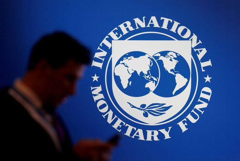 IMF cuts Asia's growth forecasts, warns of strong dollar strains