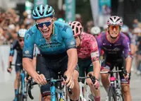 Russian Syritsa revels in rain as he wins opening stage