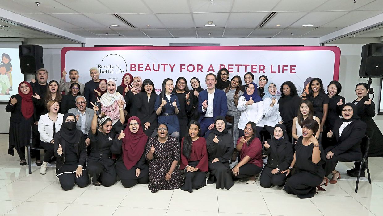 The Beauty for a Better Life programme by L'Oreal Foundation provides disadvantaged young women with professional hair dressing tuition-free training in partnership with NGO Women: Girls, to help them build a sustainable career. Photo: The Star/Yap Chee Hong