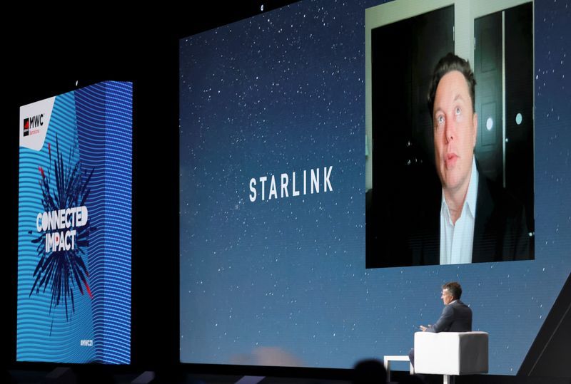 FILE PHOTO SpaceX founder and Tesla CEO Elon Musk speaks on a screen during the Mobile World Congress MWC in Barcelona Spain June 29 2021. REUTERSNacho Doce