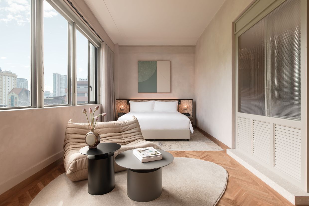 The bedheads in some of the rooms, including this one seen here, are woven by Bidayuh and Penan weavers from Sarawak. Photo: Else Kuala Lumpur