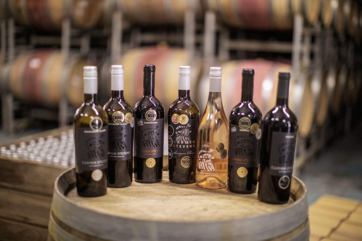 Some of the award-winning wines produced by Stevens on display.