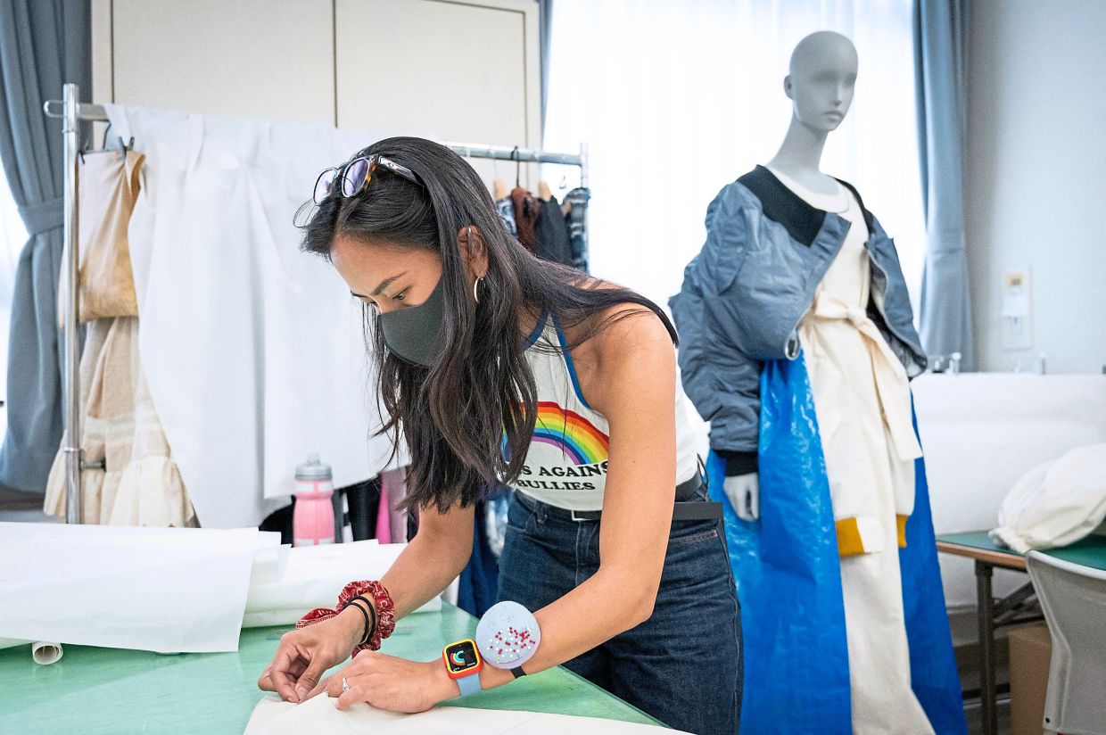 A student making a design during class at Bunka Fashion College in Tokyo. Photo: AFP