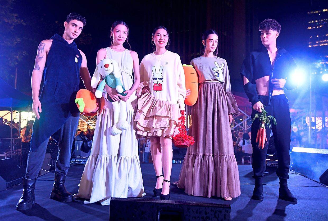 Models showing off SCAR and White Rabbit labels.