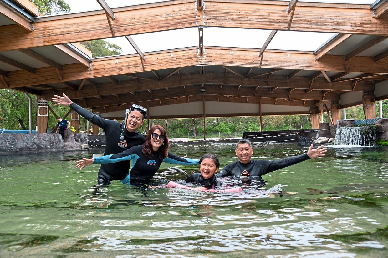 The writer (right) and his travel buddies enjoying the Irukandji Shark & Ray Encounters at Port Stephen.