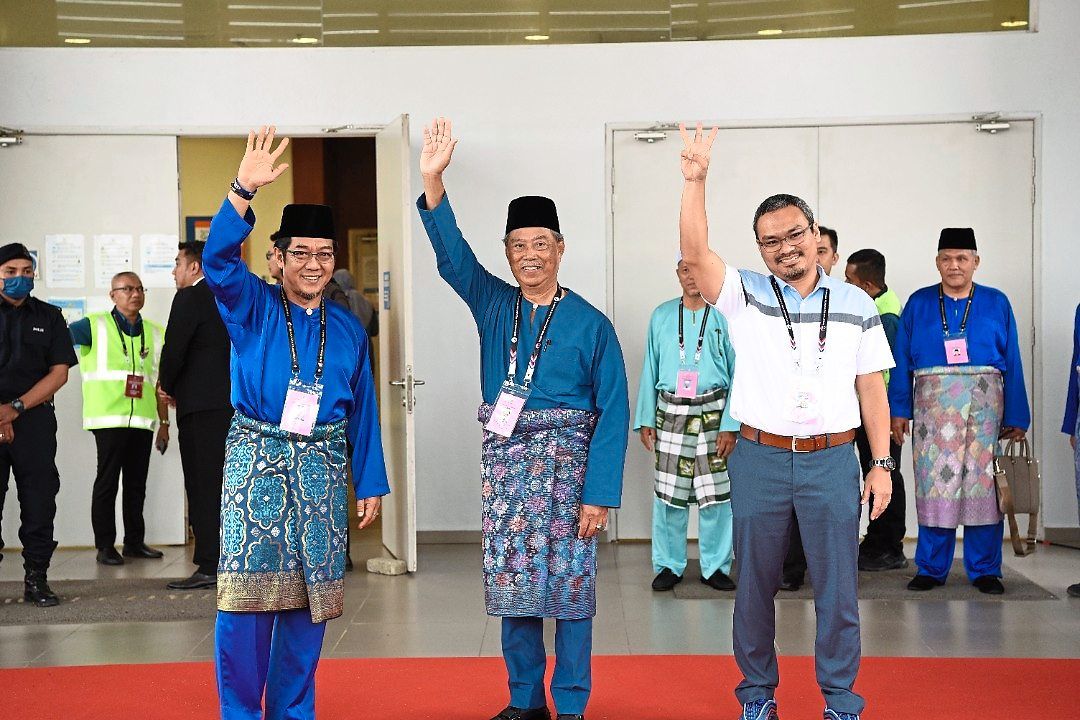 Muhyiddin (middle) is defending the seat against Razali (left) and Iskandar Shah.