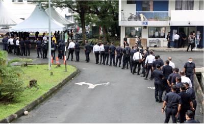 Police personnel queuing to cast their early votes at South Klang Police Headquarters in Klang. — KK SHAM/The Star