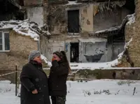 In cold Ukraine village, Banksy mural offers warm bath