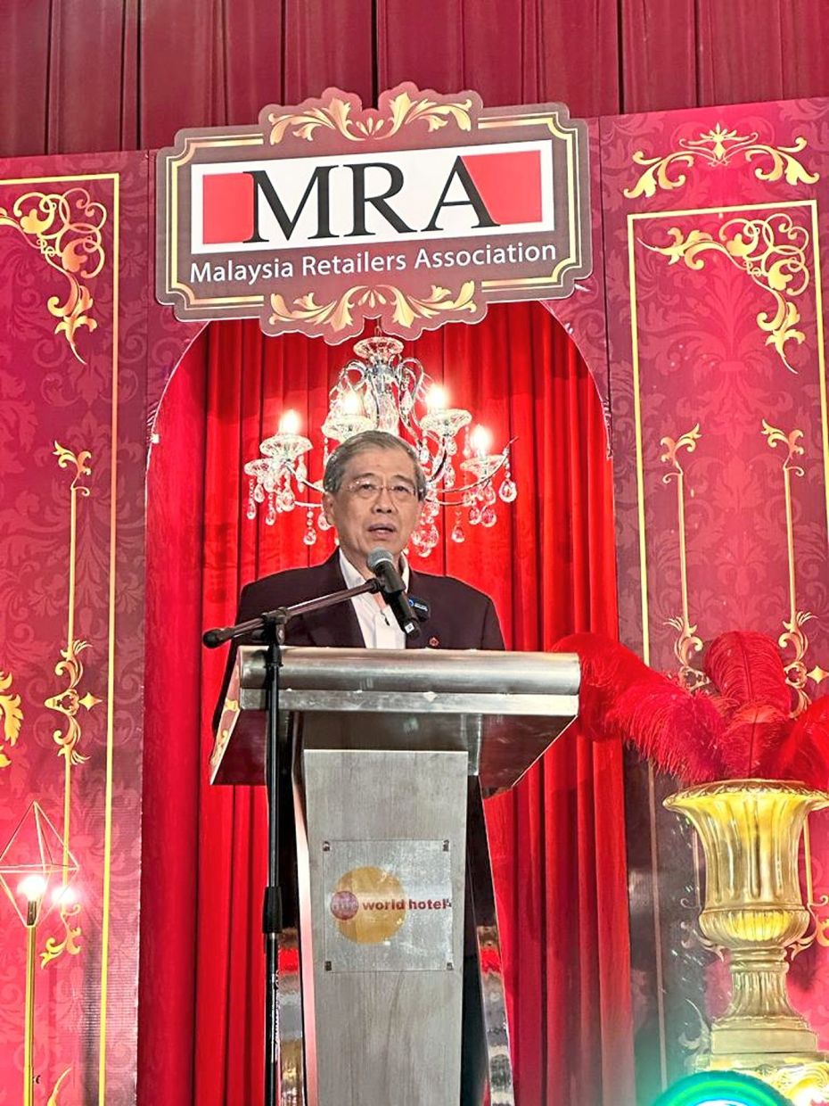 MRA president and Sogo Group deputy chairman Datuk Andrew Lim addressing guests at the MRA 40th anniversary dinner celebration in Petaling Jaya.