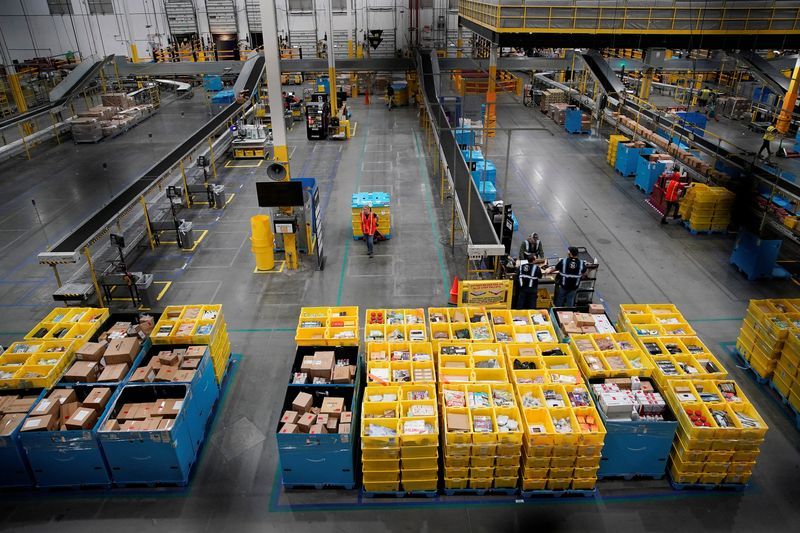 Workers select and pack items during Cyber Monday at the Amazon fulfilment centre in Robbinsville Township in New Jersey U.S. November 28 2022. REUTERSEduardo Munoz