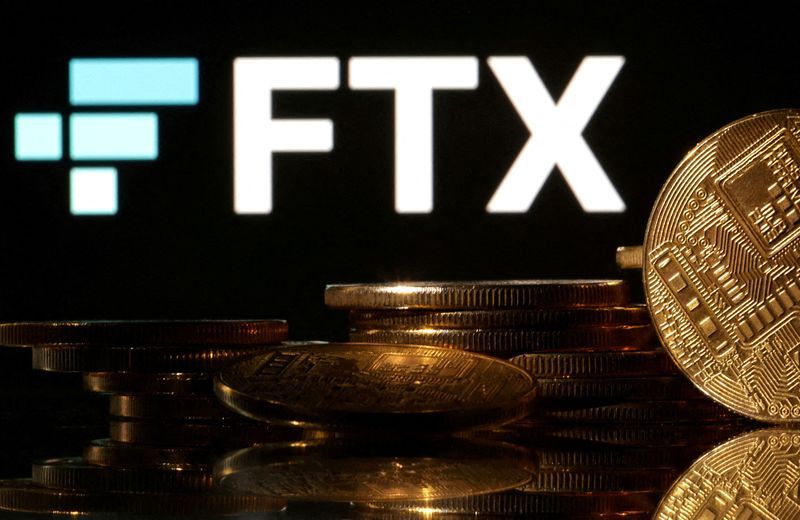 FILE PHOTO Representations of cryptocurrencies are seen in front of displayed FTX logo in this illustration taken November 10 2022. REUTERSDado RuvicIllustrationFile Photo