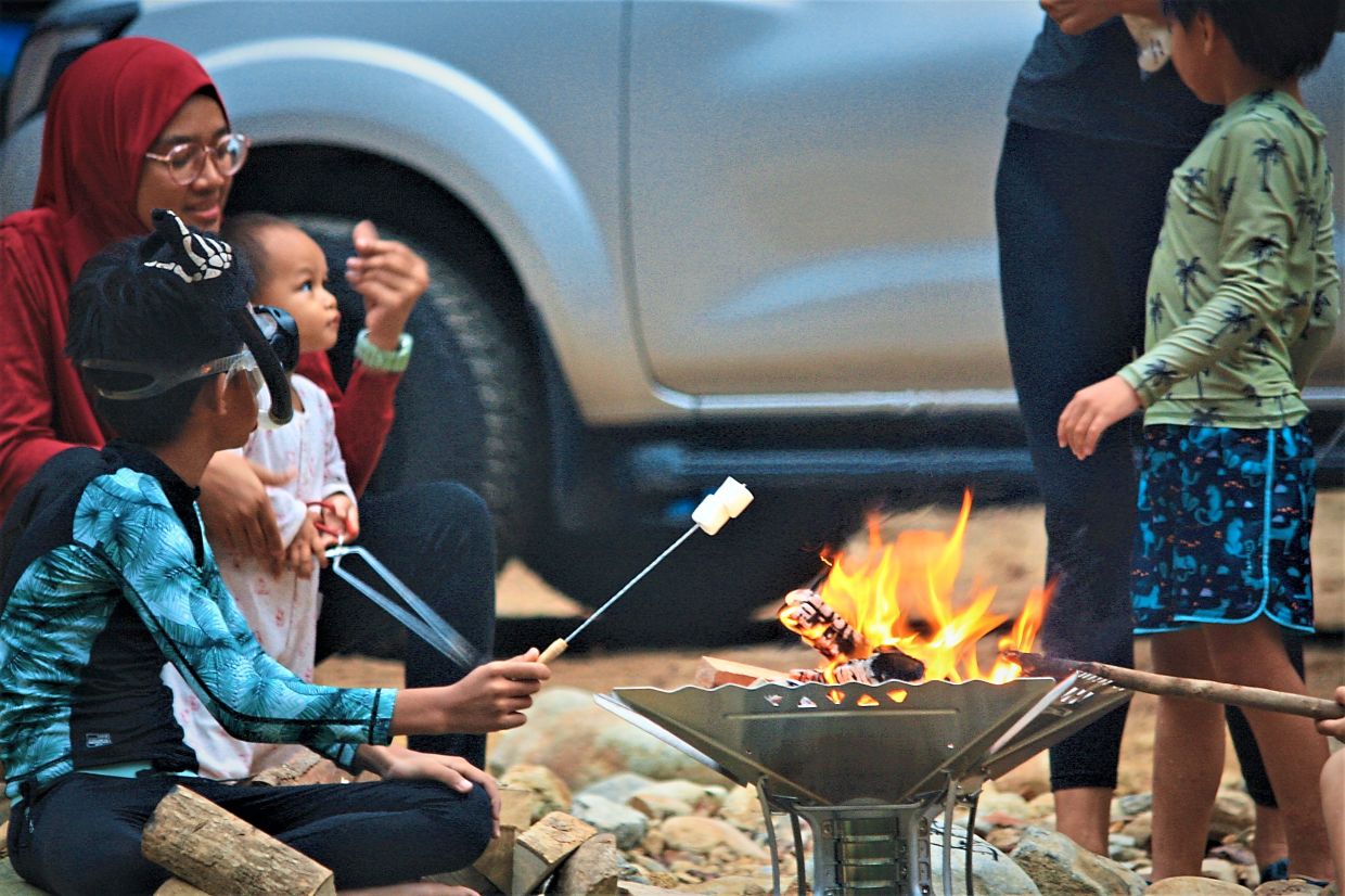 Roasting marshmallows by the fire is one of the fun activities for the children on their trips.