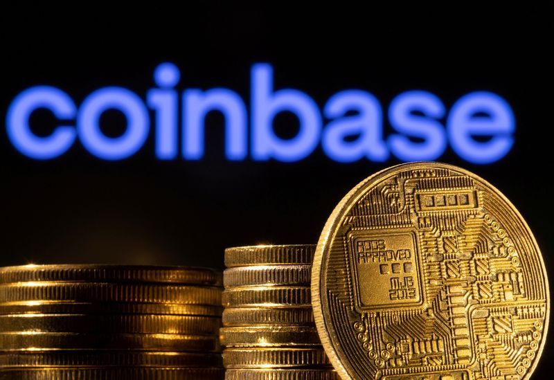 FILE PHOTO A representation of cryptocurrency is seen in front of Coinbase logo in this illustration taken March 4 2022. REUTERSDado RuvicIllustrationFile Photo