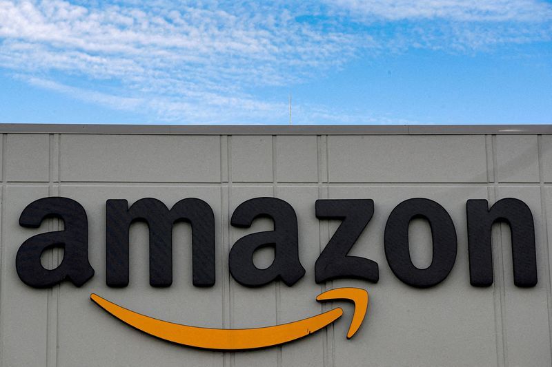 FILE PHOTO The Amazon logo is seen outside its JFK8 distribution center in Staten Island New York U.S. November 25 2020.  REUTERSBrendan McDermid