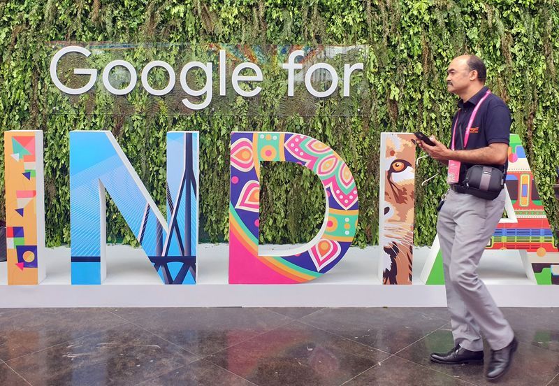 FILE PHOTO A man walks past the sign of quotGoogle for Indiaquot the companys annual technology event in New Delhi India September 19 2019. REUTERSSankalp PhartiyalFile Photo