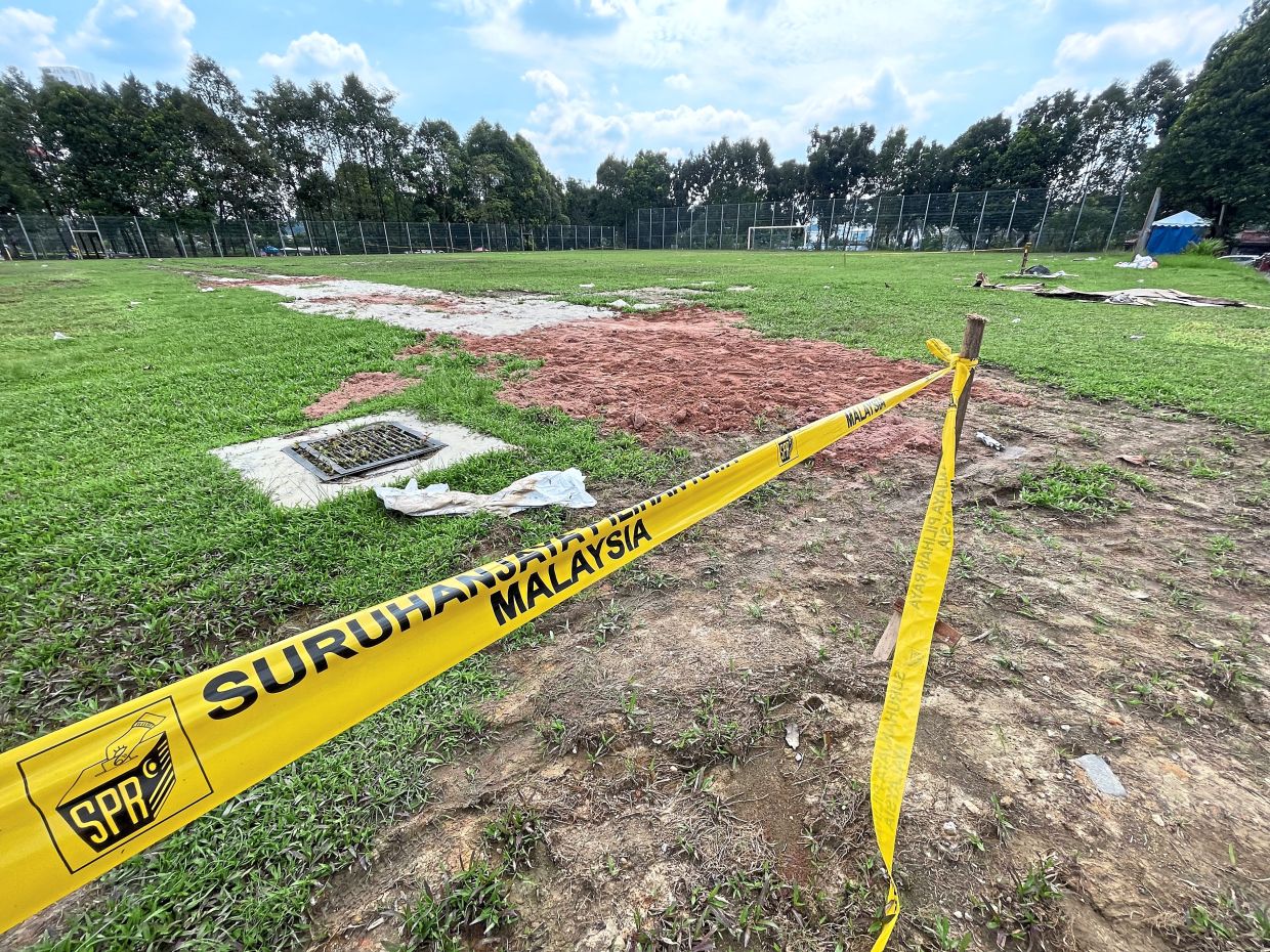 The football field at PPR Kampung Kerinchi is in an extremely poor state, after the EC used it as a polling station during GE15.