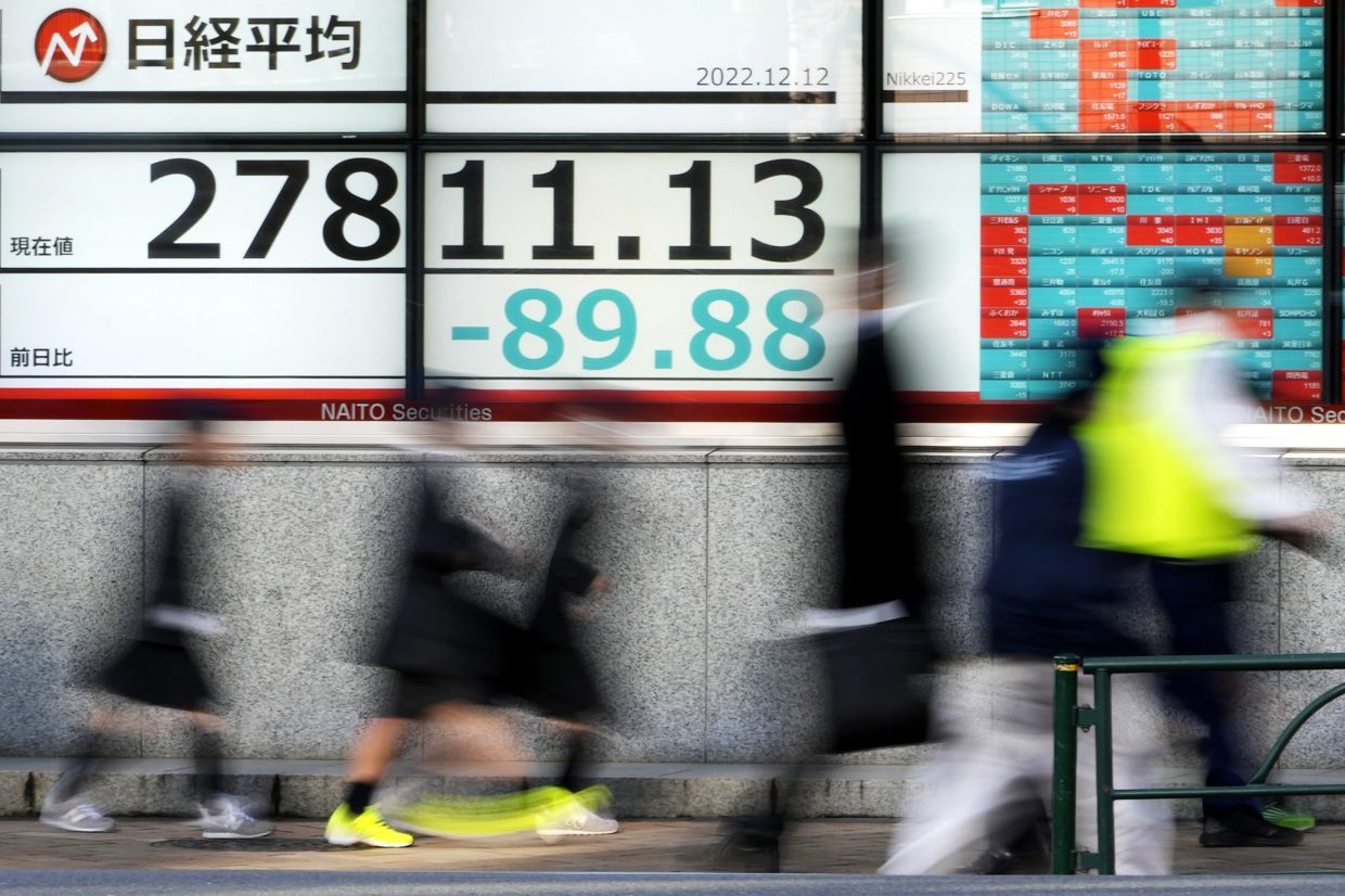 Asian markets extend US rally ahead of inflation, Fed decision | The Star