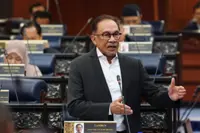 Anwar's mini budget passed without debate
