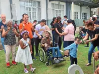 Cerebral palsy alumni elated   to reunite at Christmas event