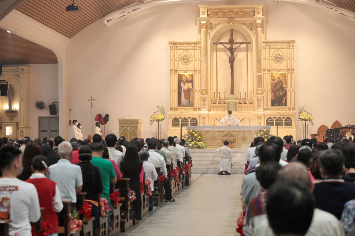 Churchgoers happy to attend Christmas mass for the first time in two