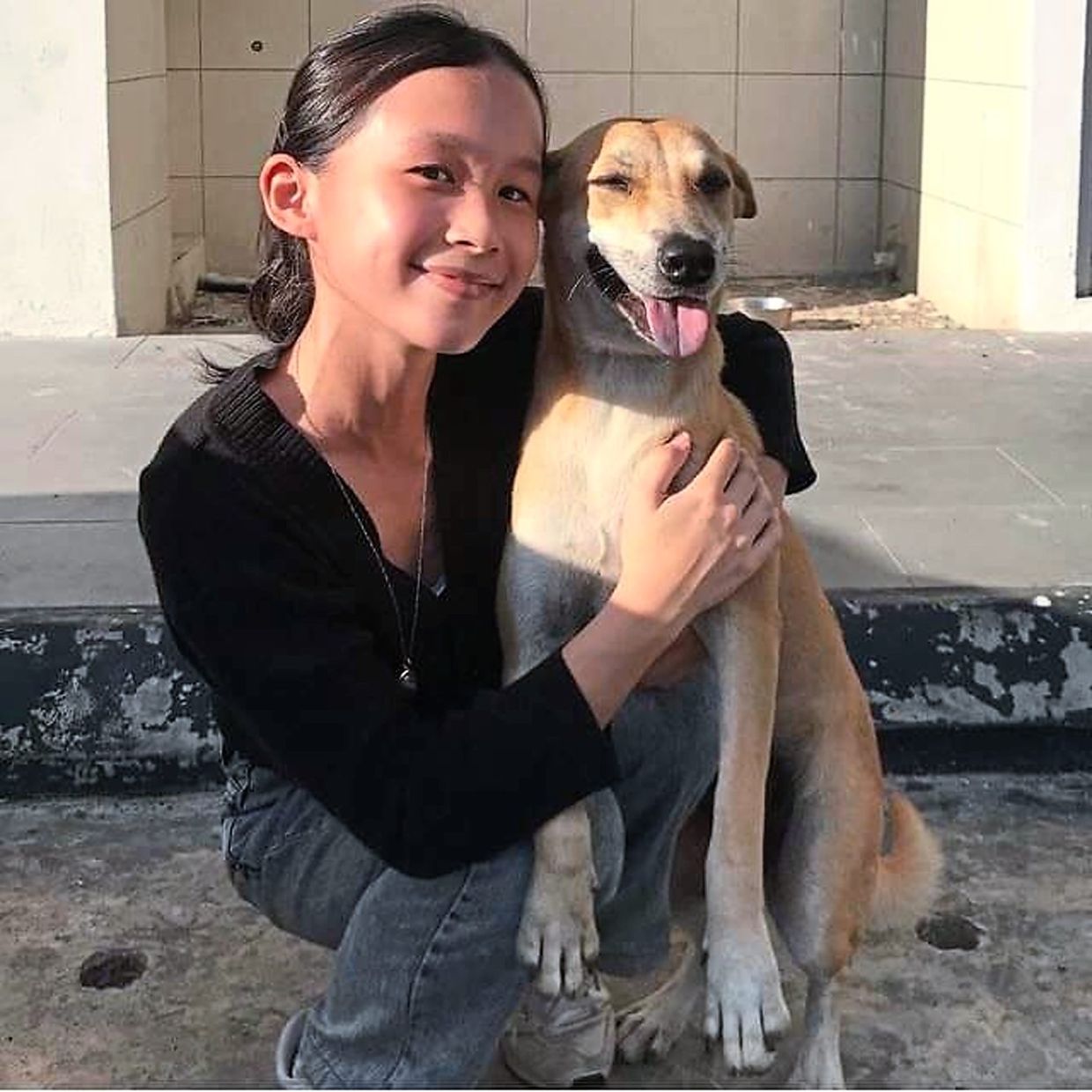 A love that runs deep: Belle founded a non-profit animal welfare organisation at the age of 17 in a bid to care for the strays in her neighbourhood.