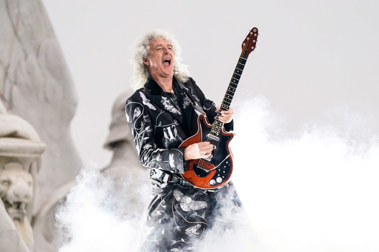 A file photo taken on June 4, 2022 British guitarist Brian May of Queen performs during the Platinum Party at Buckingham Palace as part of Queen Elizabeth II's platinum jubilee celebrations. Photo: AFP