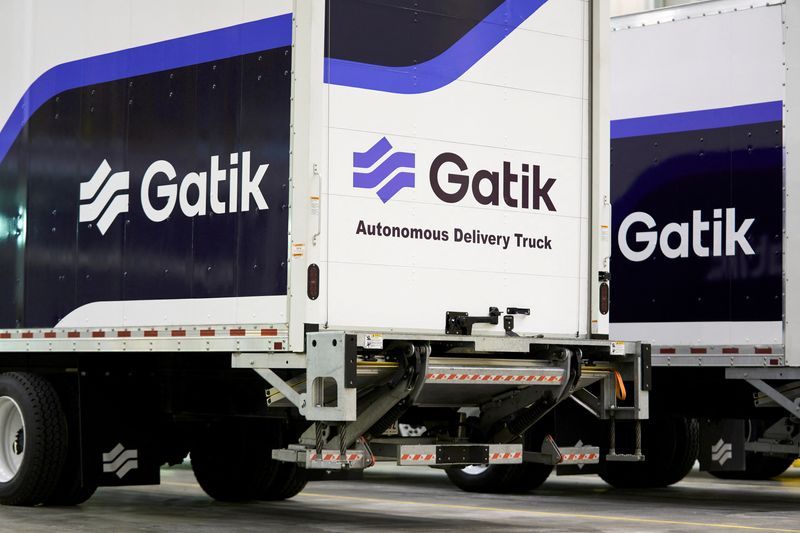 FILE PHOTO AV trucks are parked in a Gatik AI facility at AllianceTexas a 27000 acre business complex boasting some of the countrys largest freight operations in Fort Worth Texas U.S. May 18 2022. Picture taken May 18 2022. REUTERSCooper Neill
