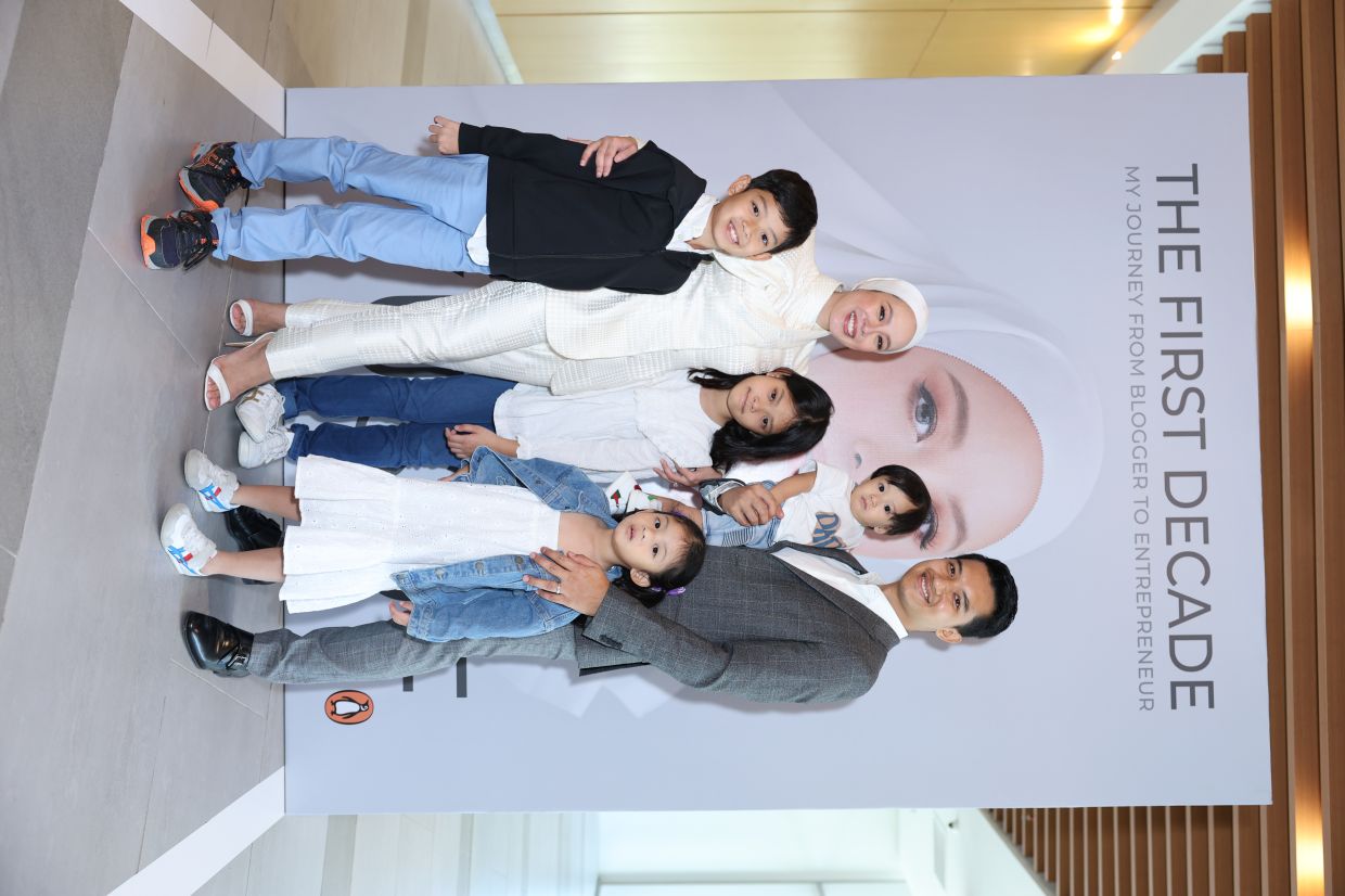 Vivy and her family at the book launch. 
